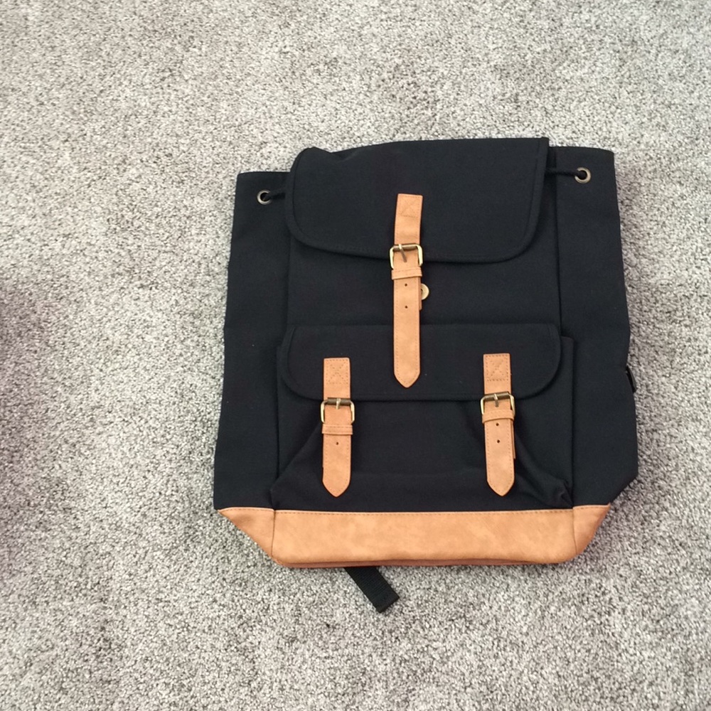 New DSW black with faux leather straps backpack